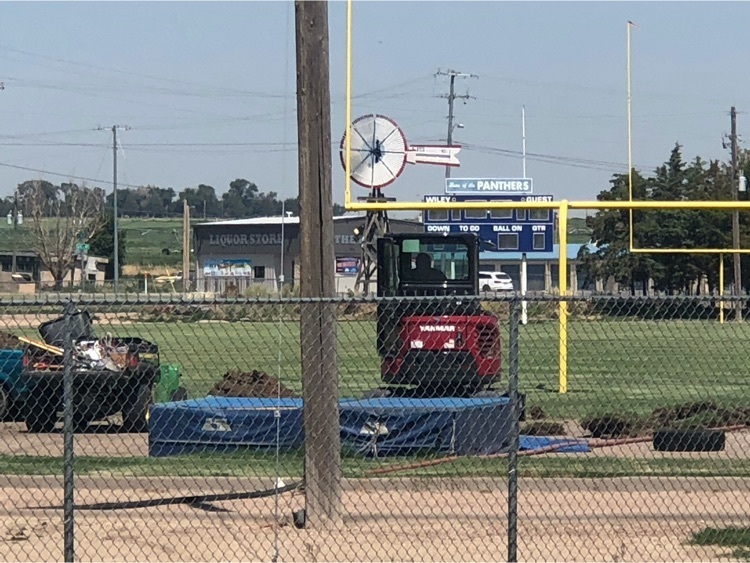 Football field work.